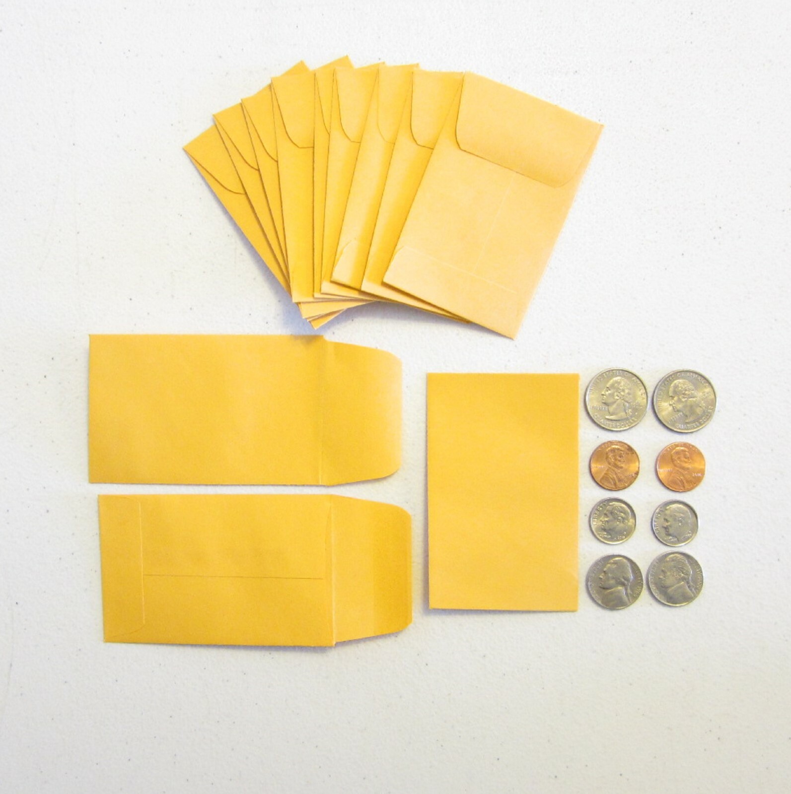 25 NEW UNIVERSAL KRAFT COIN ENVELOPES WITH GUMMED FLAP SIZE #1 2.25″ BY 3.5″