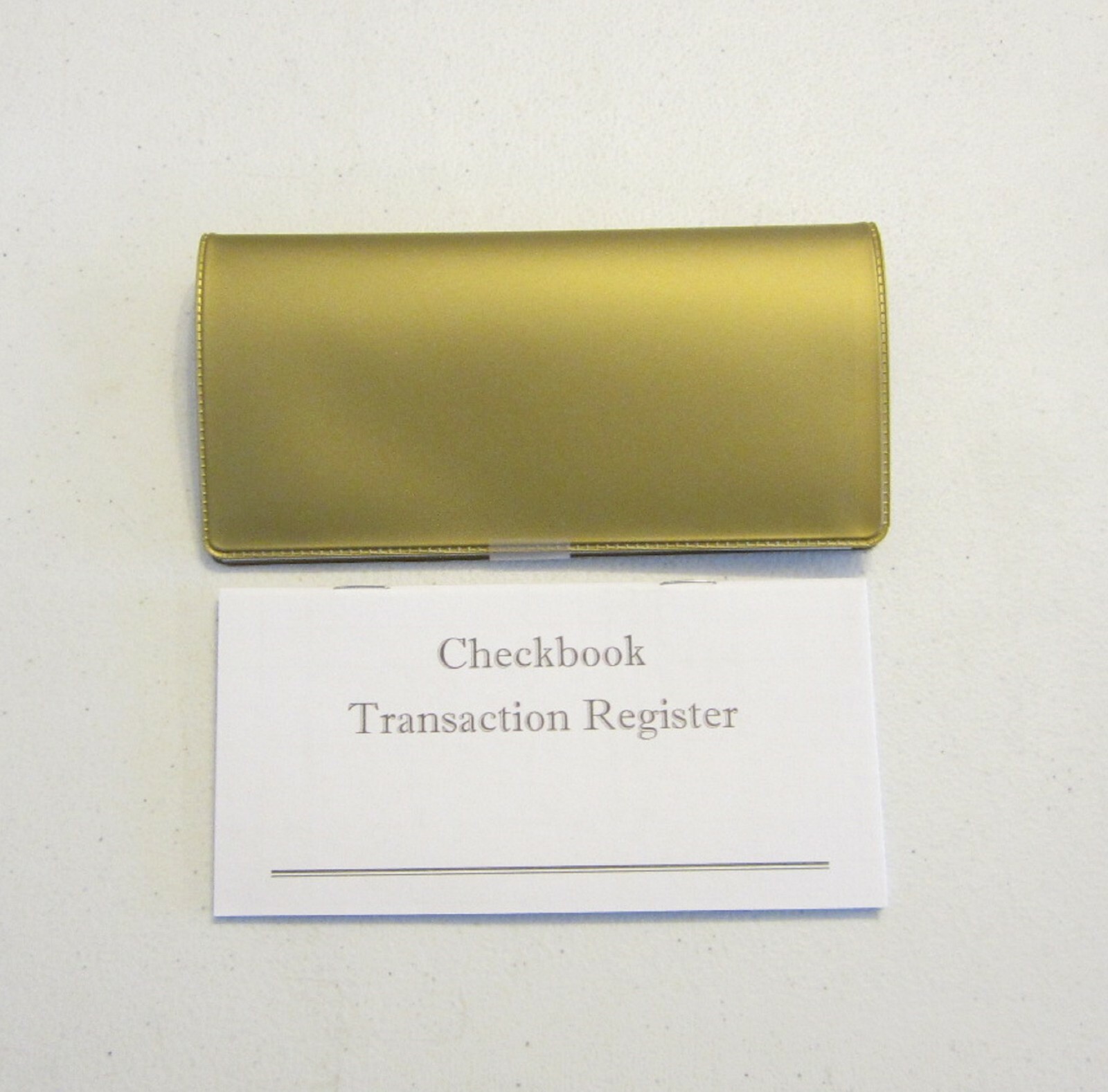 1 NEW GOLD VINYL CHECK BOOK COVER & 6 NEW CHECKBOOK TRANSACTION REGISTERS