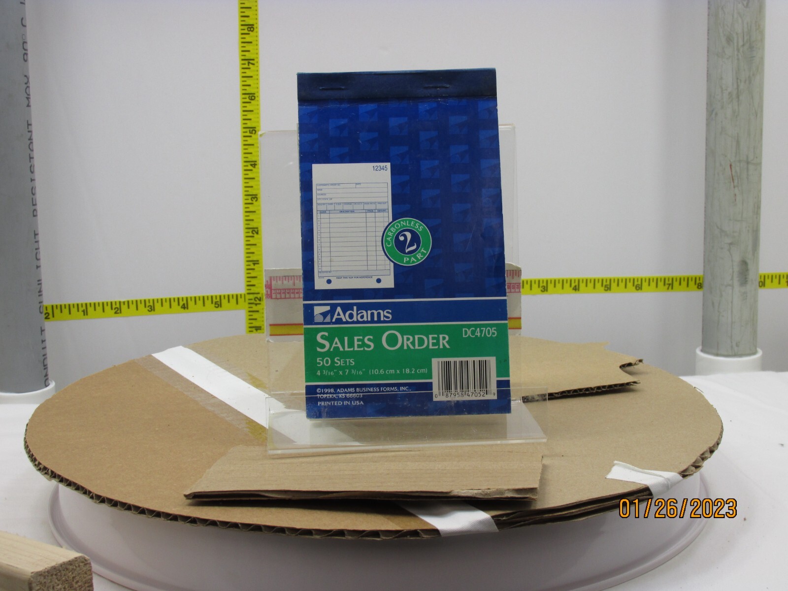 The listing is for:(1)Adams DC4705 4 3/16″x7 3/16″ 2-PartCarbonlessSalesOrderPad