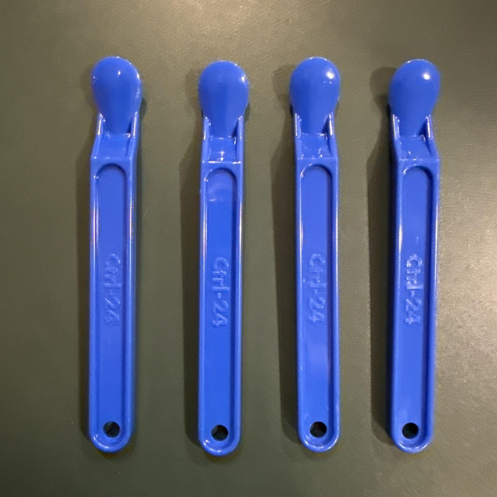 lot of 4 label sticker remover blue plastic