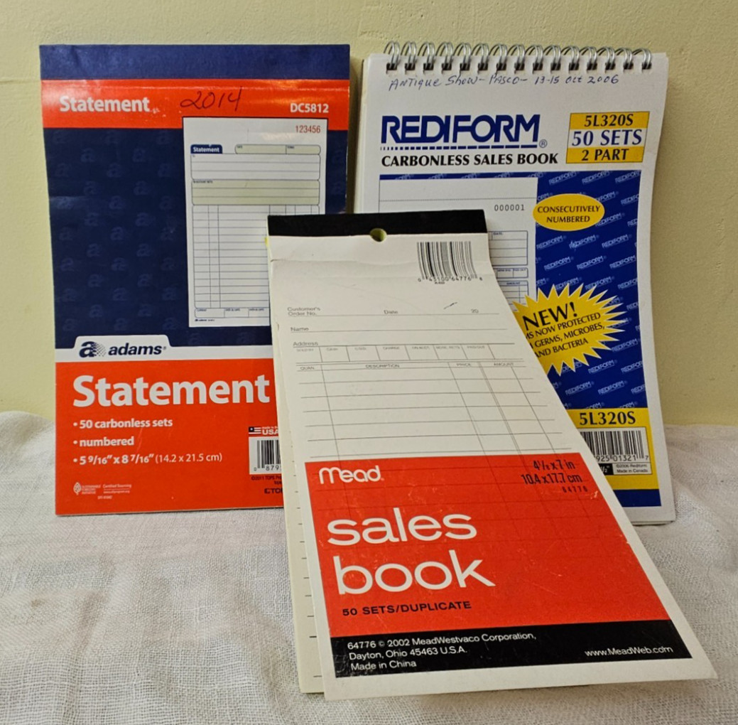 3- used carbonless sales books (pictures of beginning and ending numbers)