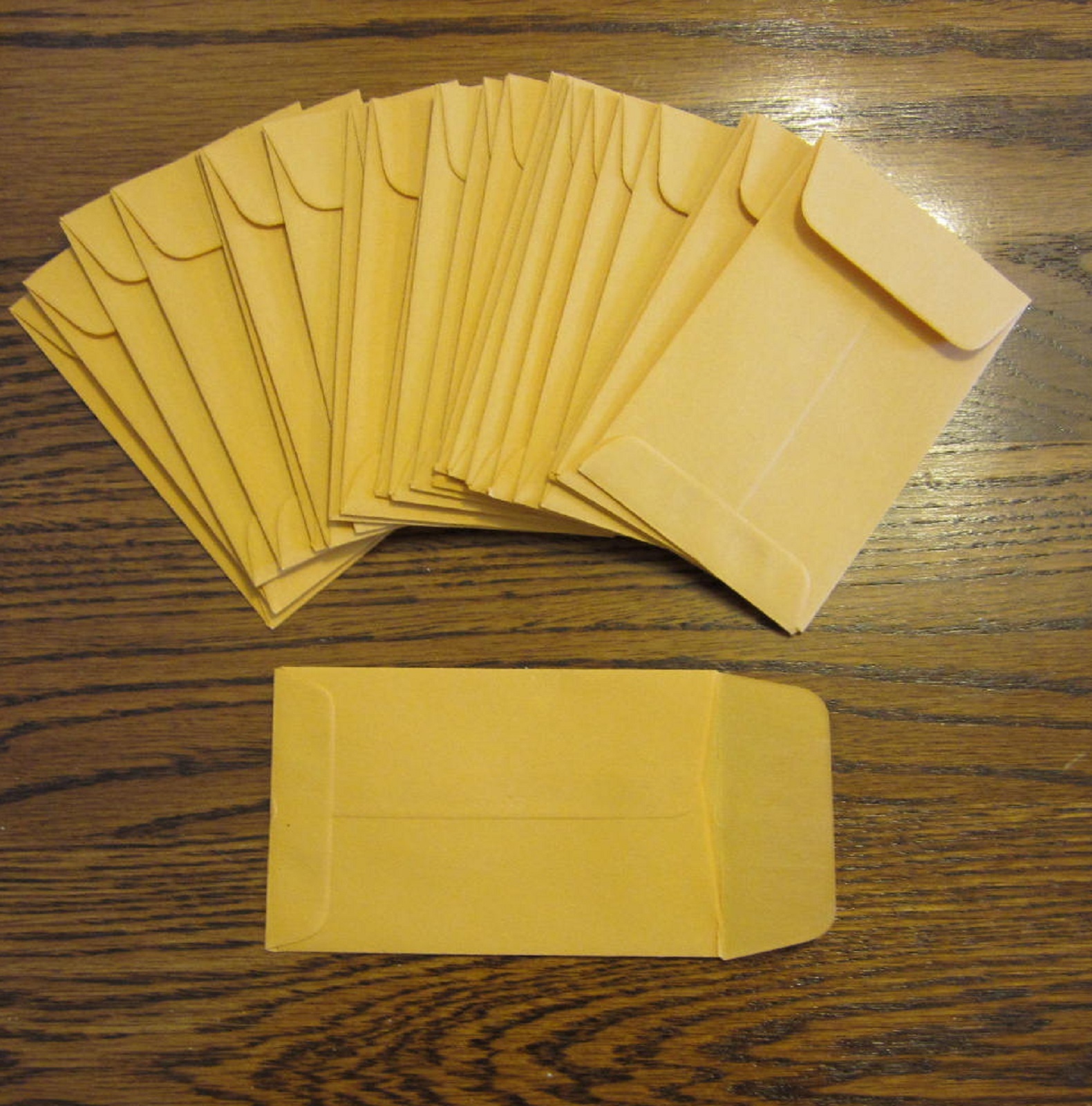 100 UNIVERSAL KRAFT COIN ENVELOPES #1 SIZE 2.25″ BY 3.5″ WITH GUMMED FLAP