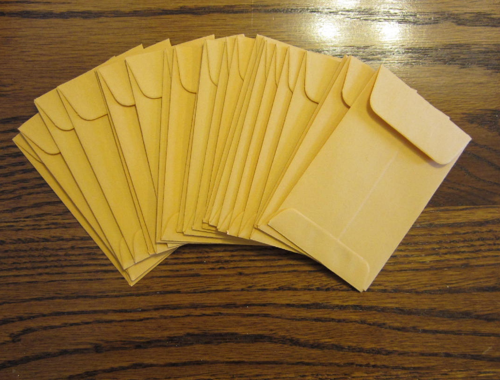 100 UNIVERSAL KRAFT COIN ENVELOPES #1 SIZE 2.25″ BY 3.5″ WITH GUMMED FLAP