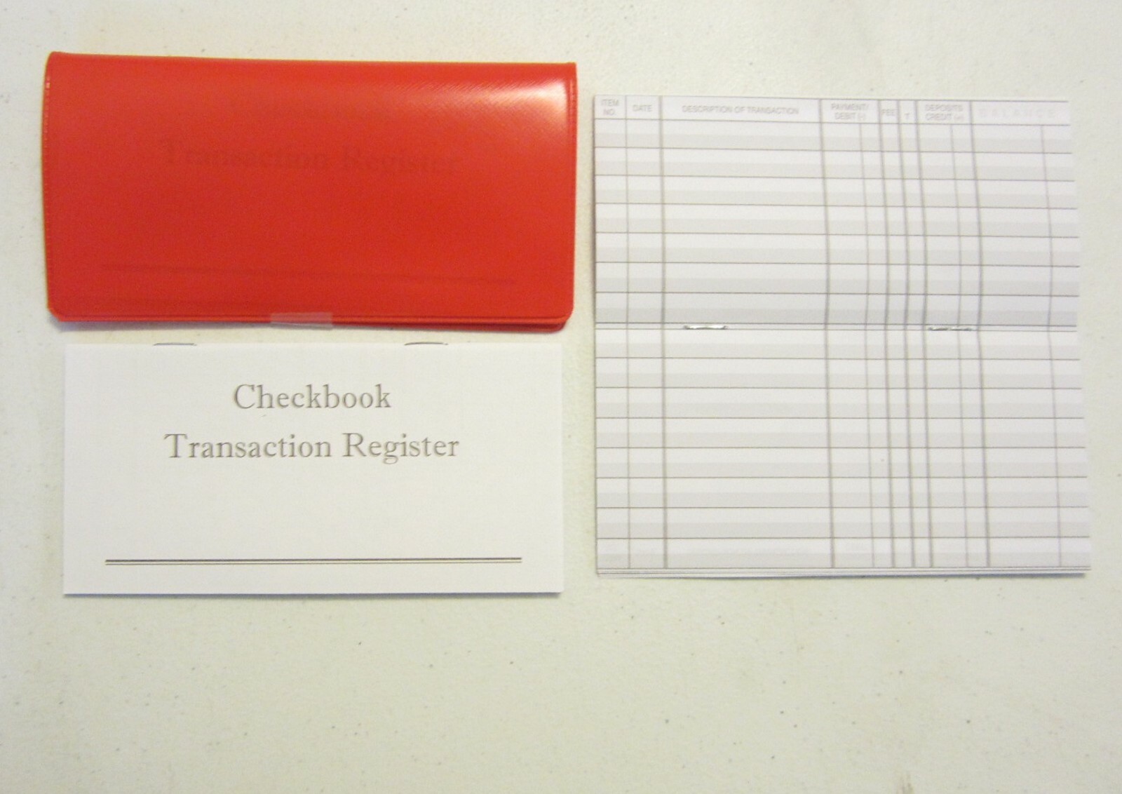 1 RED VINYL CHECK BOOK COVER DUPLICATE FLAP & 6 CHECKBOOK TRANSACTION REGISTERS