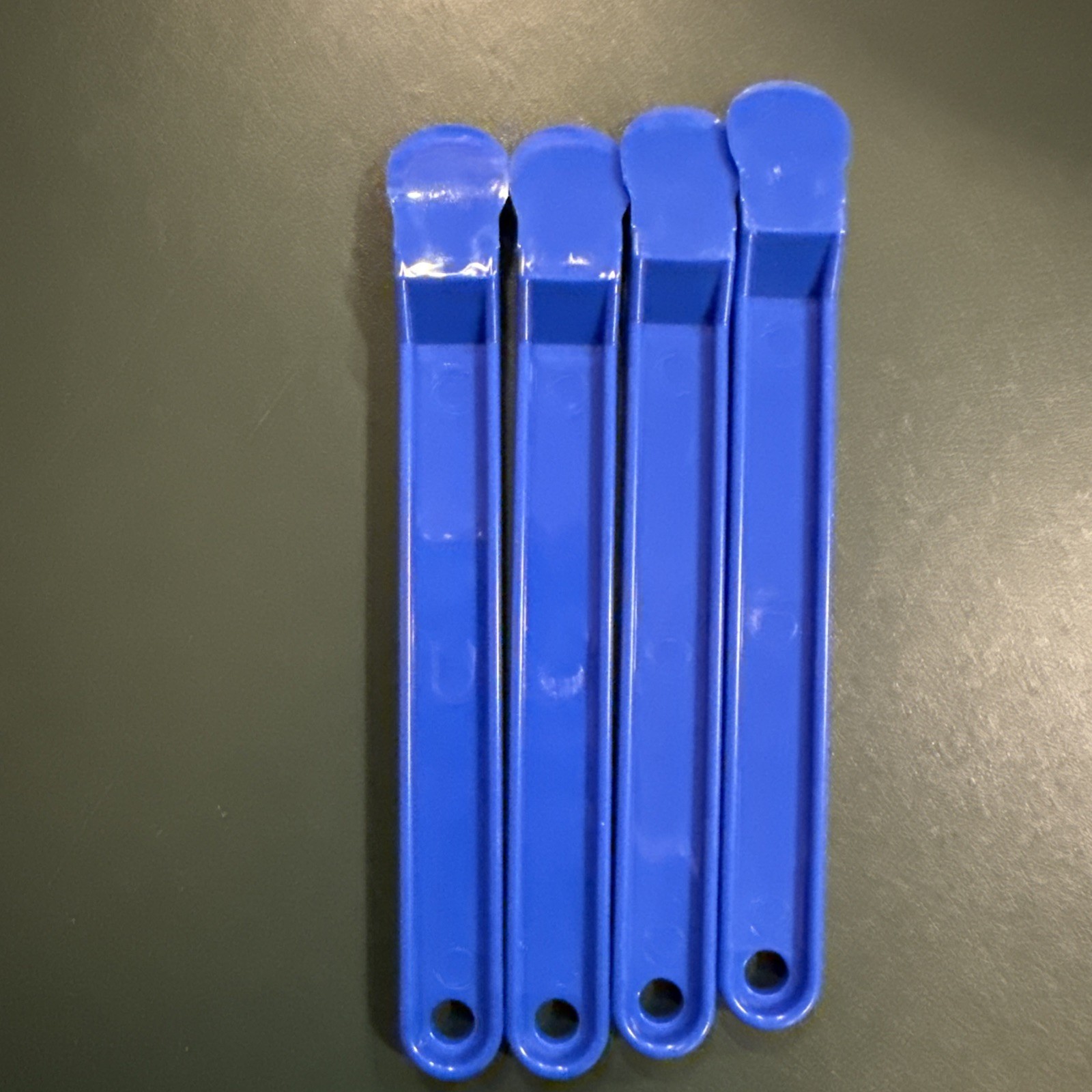 lot of 4 label sticker remover blue plastic