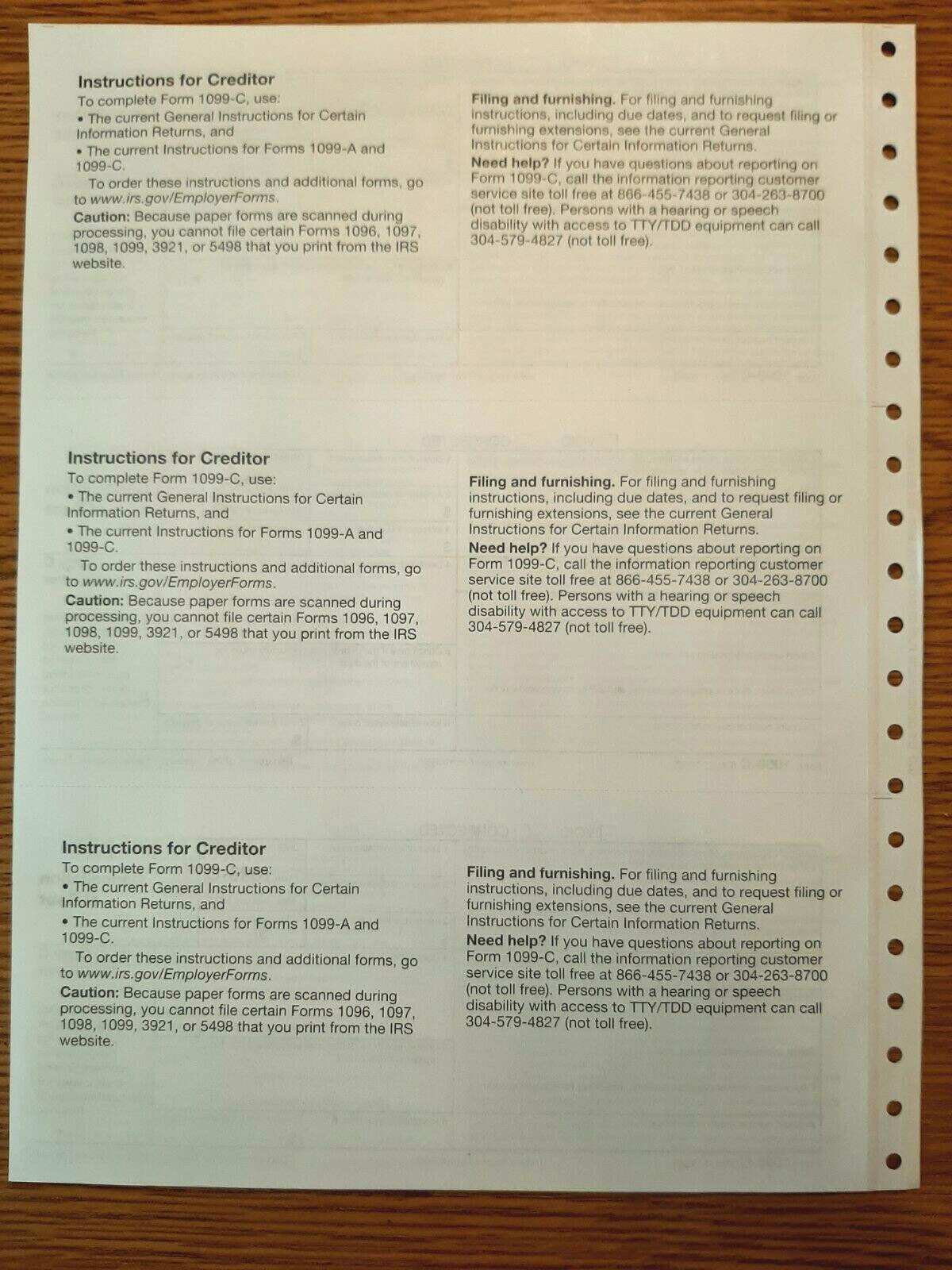 Undated IRS Tax Form 1099-C single sheet set for 3 debtors, carbonless 3-pt, 3UP